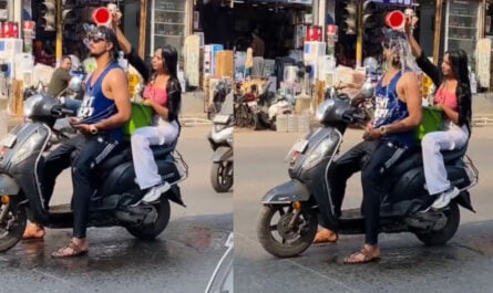 couple bathing while riding on scooty vedio viral